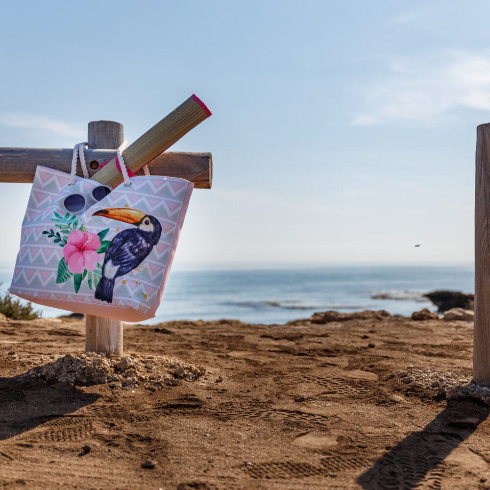 Paisaje de playa con capazo